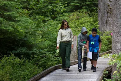 Forest Service Employee with youth at Baker Lake, Mt Baker Snoqualmie National Forest (31268333914)