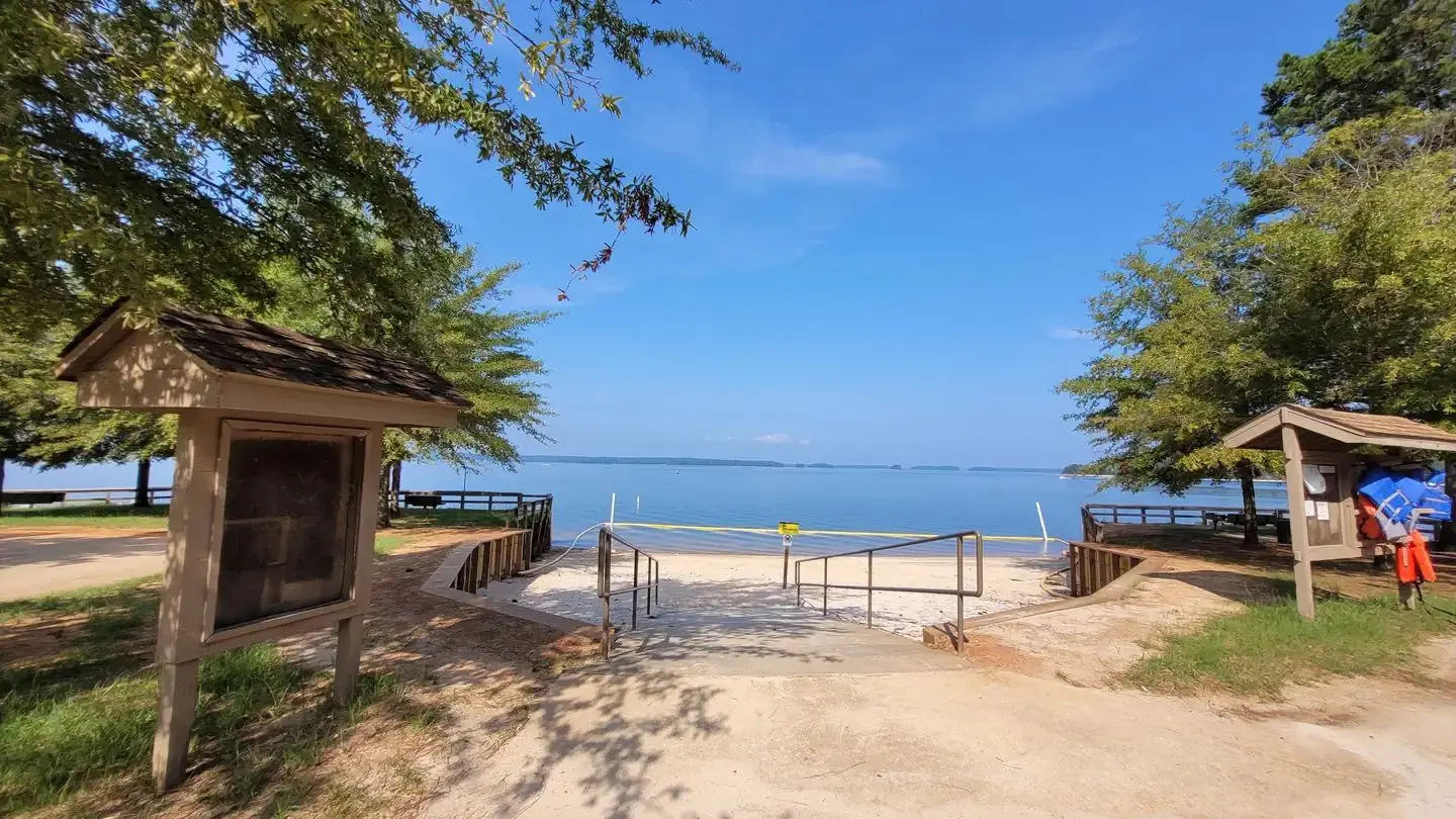 Elijah Cove Designated Swim Area, life jacket loaner station, and picnic shelter