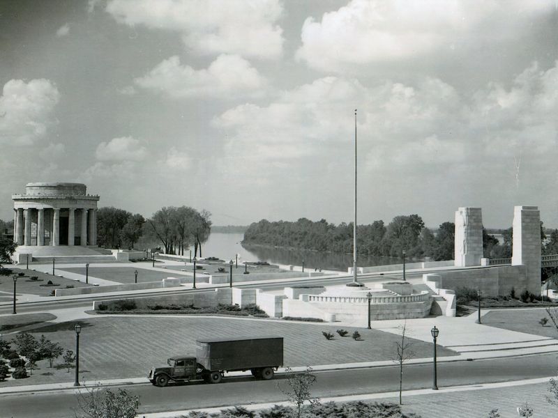The Clark memorial and bridge approach with agriculture truck in foreground.