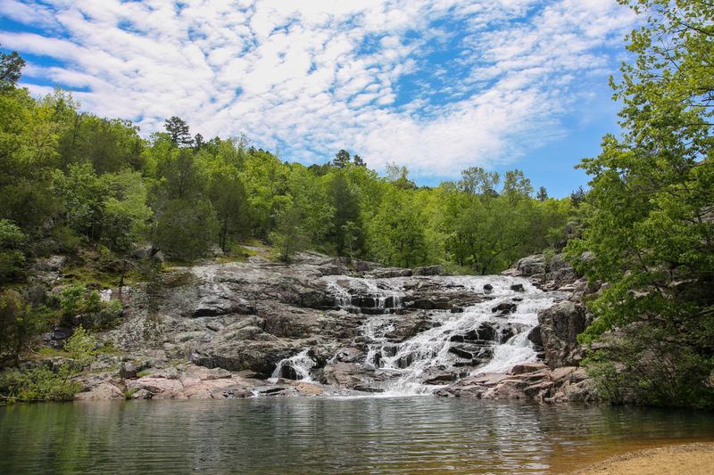 A rocky "shut-in" with a modest waterfall.