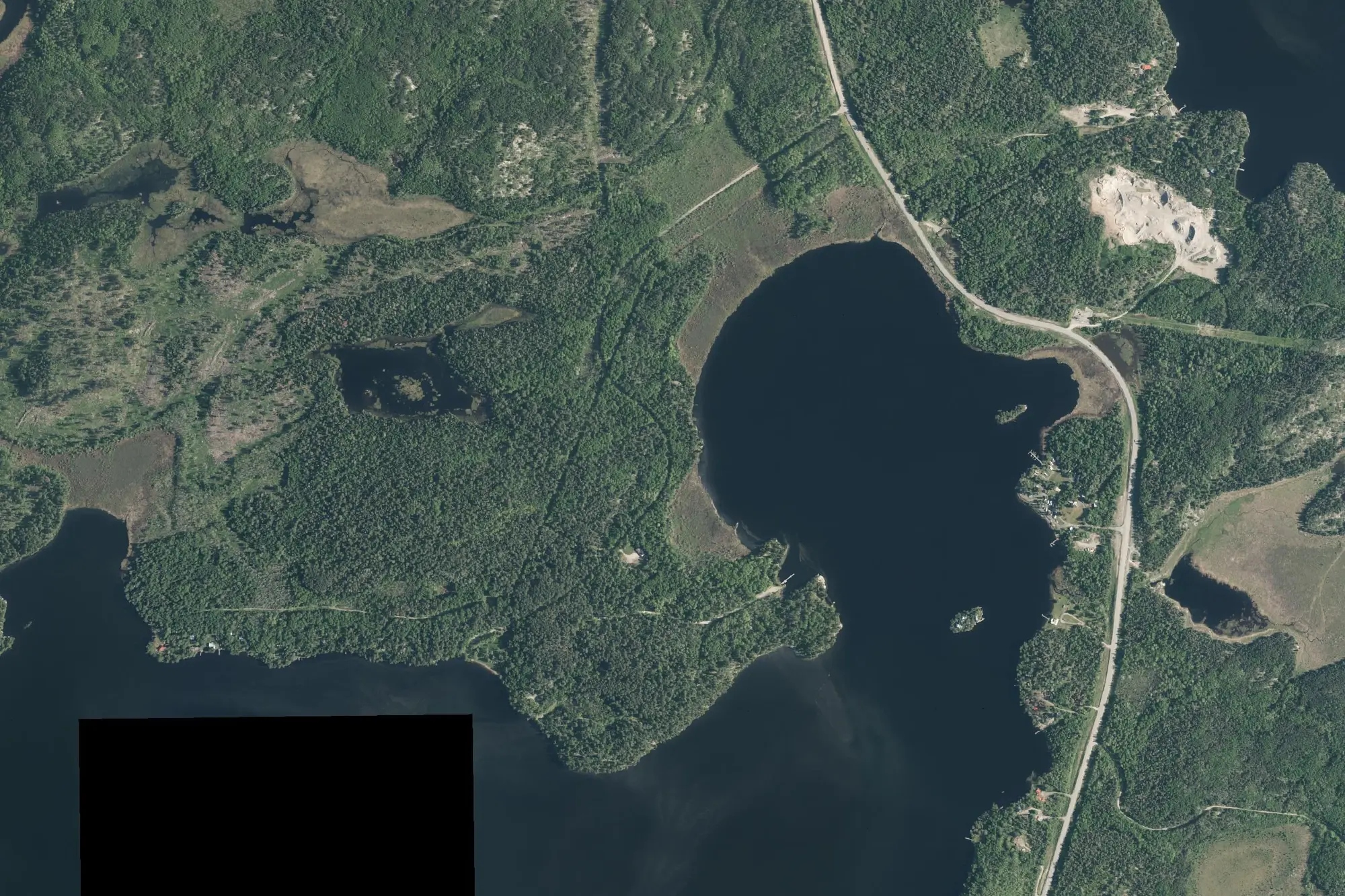 Aerial view of Caliper Lake Provincial Park (Recreational Class)