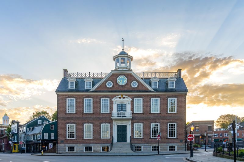Historic Newport Colony House with brick facade and clock tower.