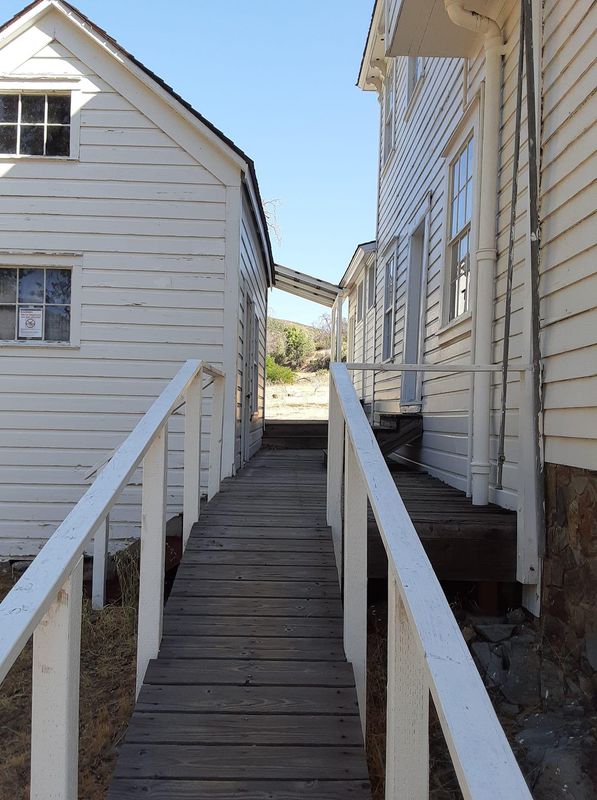 White houses and white outbuildings.